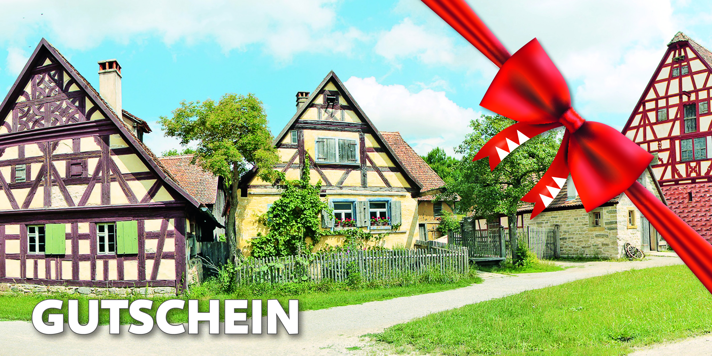 Bild des Gutscheins mit roter Schleife für eine Schnuppermitgliedschaft